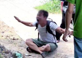 Bình Dương: Nam tài xế ô tô ‘ngồi luyện công’ trên vỉa hè sau khi tông đổ cây