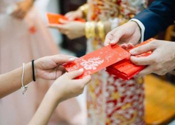 Cha mẹ tự ý lấy tiền lì xì của con có vi phạm pháp luật không?